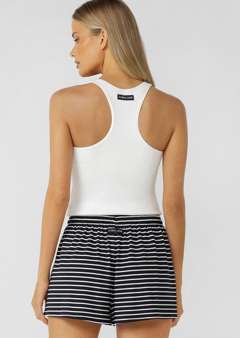 Wear Anywhere Wardrobe Essential
Built In Shelf Bra for All Day Support
Form Flattering Full Length Fitted Silhouette
Soft Touch Cotton Blend Rib Fabrication
Woven Logo Badge