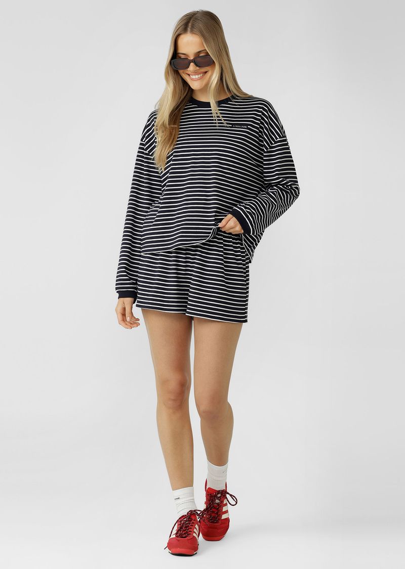 Versatile Lounge Essential
Classic Ribbed Crew Neckline and Cuffs
Form Flattering Mid Length Relaxed Silhouette
Premium Cotton Fabrication In a Classic Stripe Design
Woven Logo Badge