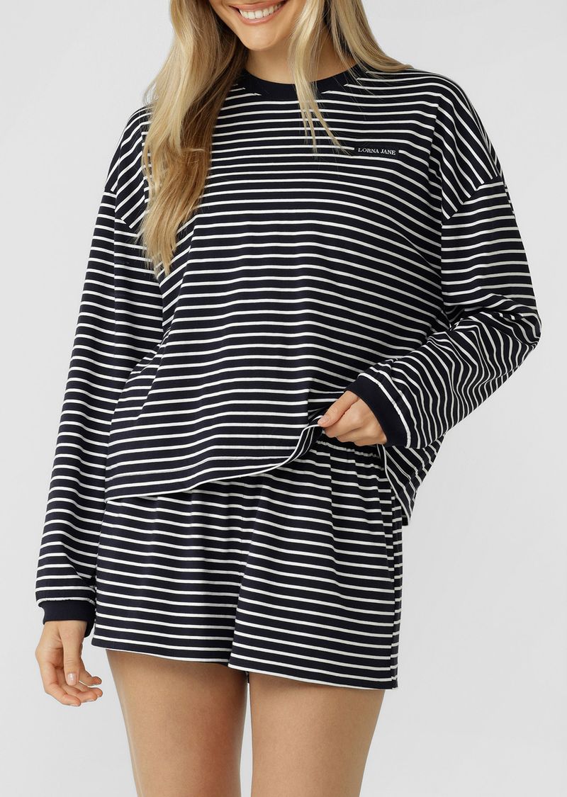 Versatile Lounge Essential
Classic Ribbed Crew Neckline and Cuffs
Form Flattering Mid Length Relaxed Silhouette
Premium Cotton Fabrication In a Classic Stripe Design
Woven Logo Badge