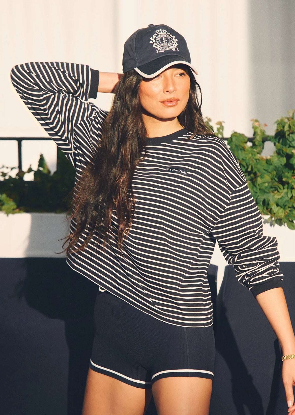 Versatile Lounge Essential
Classic Ribbed Crew Neckline and Cuffs
Form Flattering Mid Length Relaxed Silhouette
Premium Cotton Fabrication In a Classic Stripe Design
Woven Logo Badge