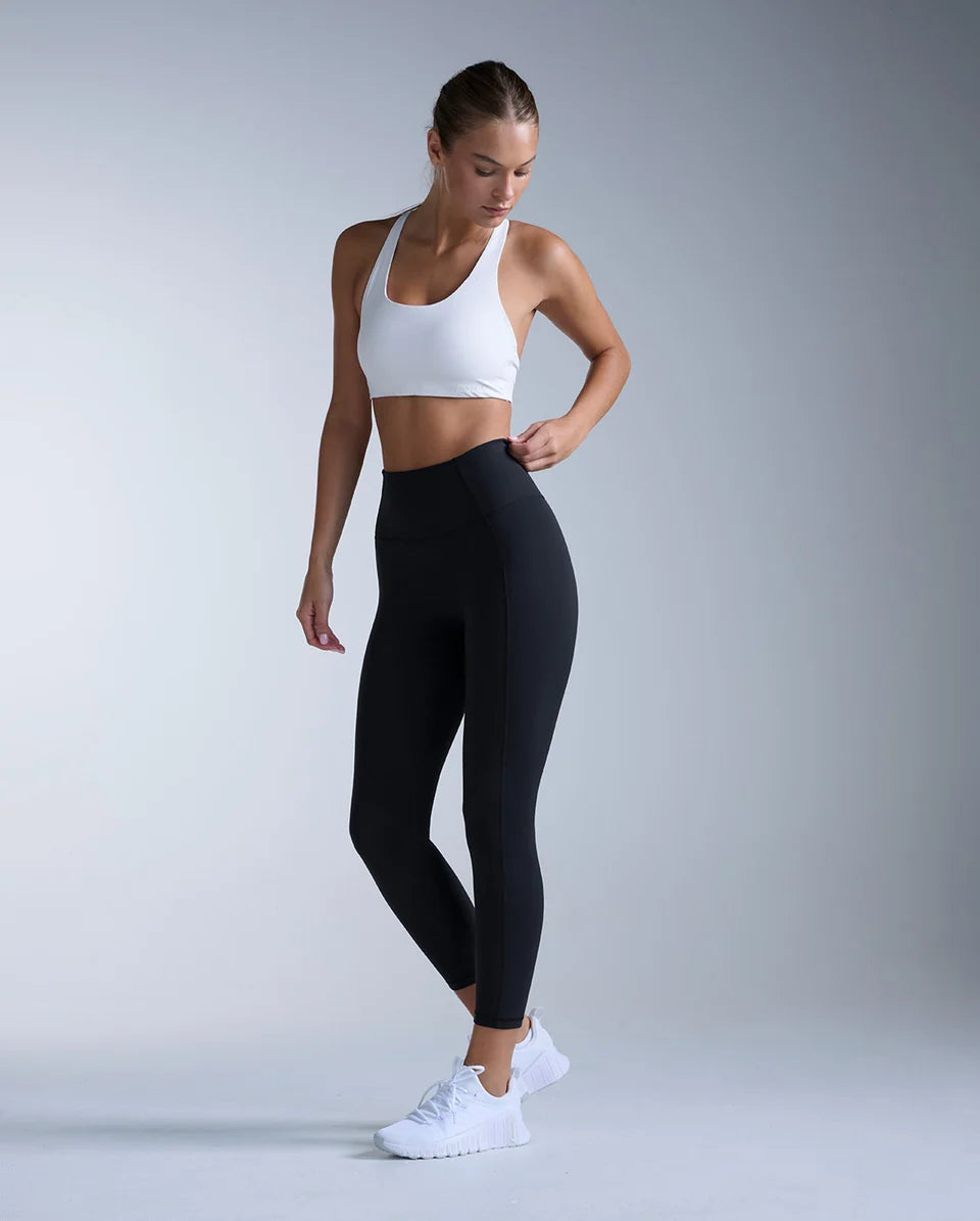 The buttery smooth Fluid Hi-Rise 7/8 Tights contour through the waist and hips for sculpted support that bends, stretches, and moves with you. The versatile cut and V-back shaping create a smooth, flattering silhouette for every
