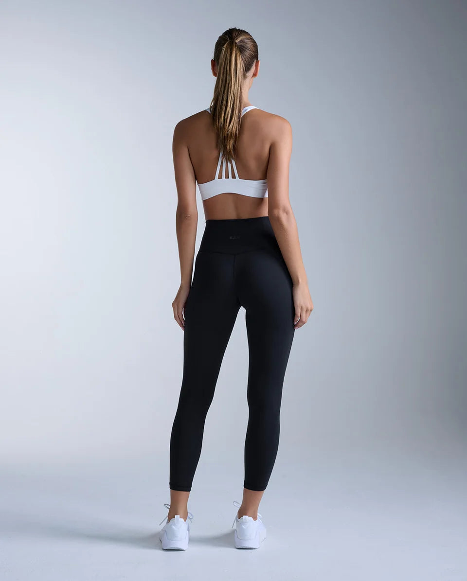 The buttery smooth Fluid Hi-Rise 7/8 Tights contour through the waist and hips for sculpted support that bends, stretches, and moves with you. The versatile cut and V-back shaping create a smooth, flattering silhouette for every