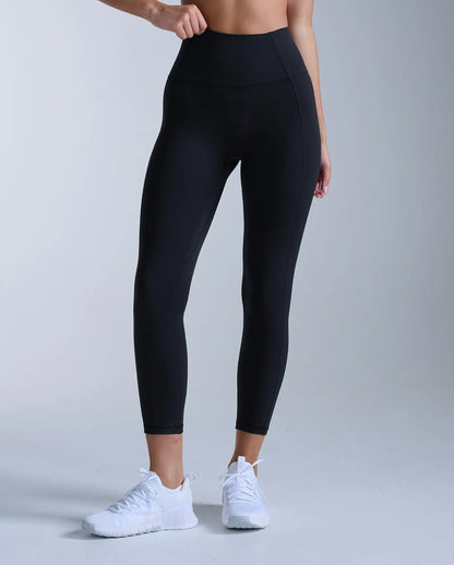 The buttery smooth Fluid Hi-Rise 7/8 Tights contour through the waist and hips for sculpted support that bends, stretches, and moves with you. The versatile cut and V-back shaping create a smooth, flattering silhouette for every