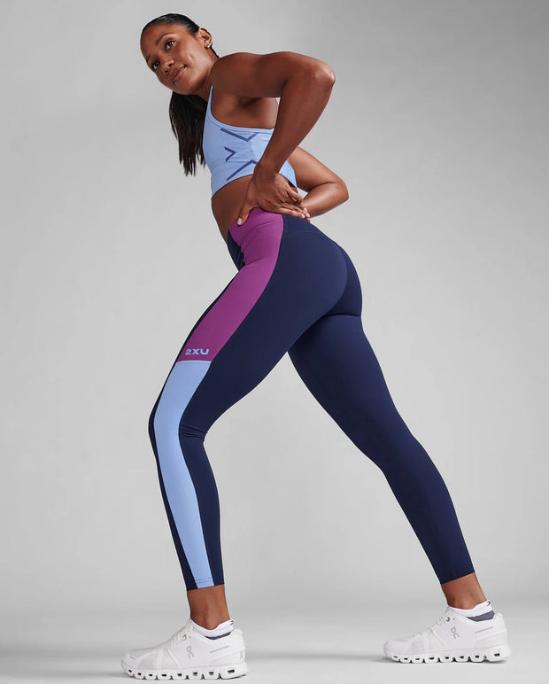 Form Spliced Hi-Rise Compression Tights Made with contrast panels down the outside of each leg, the Form Spliced Hi-Rise Compression Tights offer a drop-in mesh pocket at the hip and will allow you to stretch and move without limits.