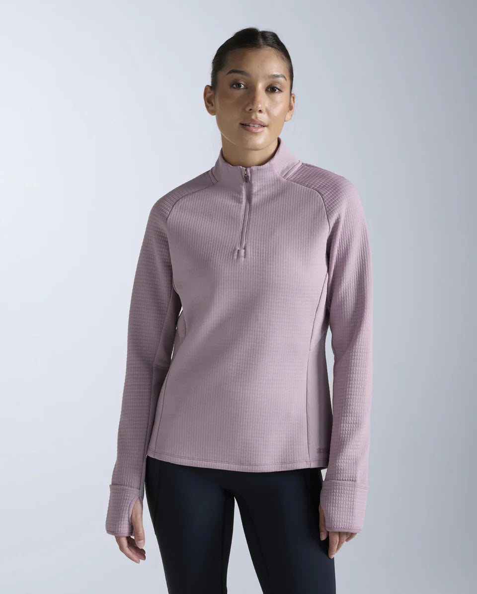 1. 1/4 zip long sleeve
2. Stand collar for neck coverage
3. 315gsm textured puff grid encapsulates air for optimal warmth while reducing microfiber shedding
4. Zip for versatile air flow management
5. Cuffs with thumbholes and flip over mittens to keep cold hands at bay
6. Reflective logos and trims
7. This garment contains recycled yarns