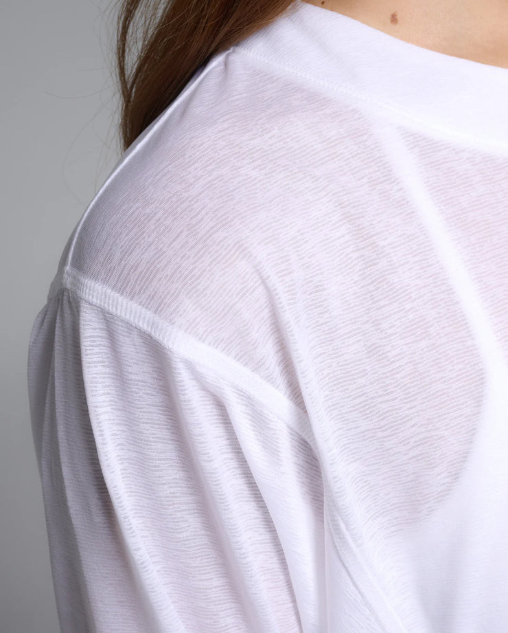 The incredibly lightweight and breathable ReLight Long Sleeve is made from a recycled textured sheer abrasion and snag resistant fabric to let you move freely from your first pose to your last.