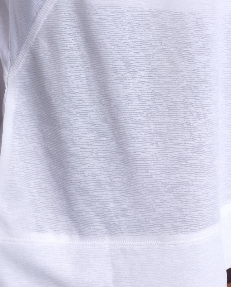 The incredibly lightweight and breathable ReLight Long Sleeve is made from a recycled textured sheer abrasion and snag resistant fabric to let you move freely from your first pose to your last.