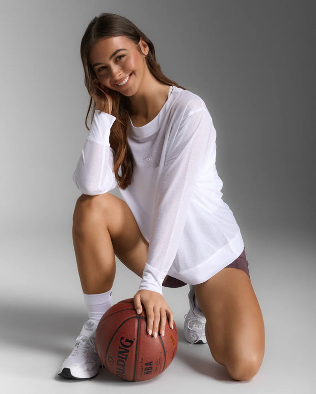 The incredibly lightweight and breathable ReLight Long Sleeve is made from a recycled textured sheer abrasion and snag resistant fabric to let you move freely from your first pose to your last.