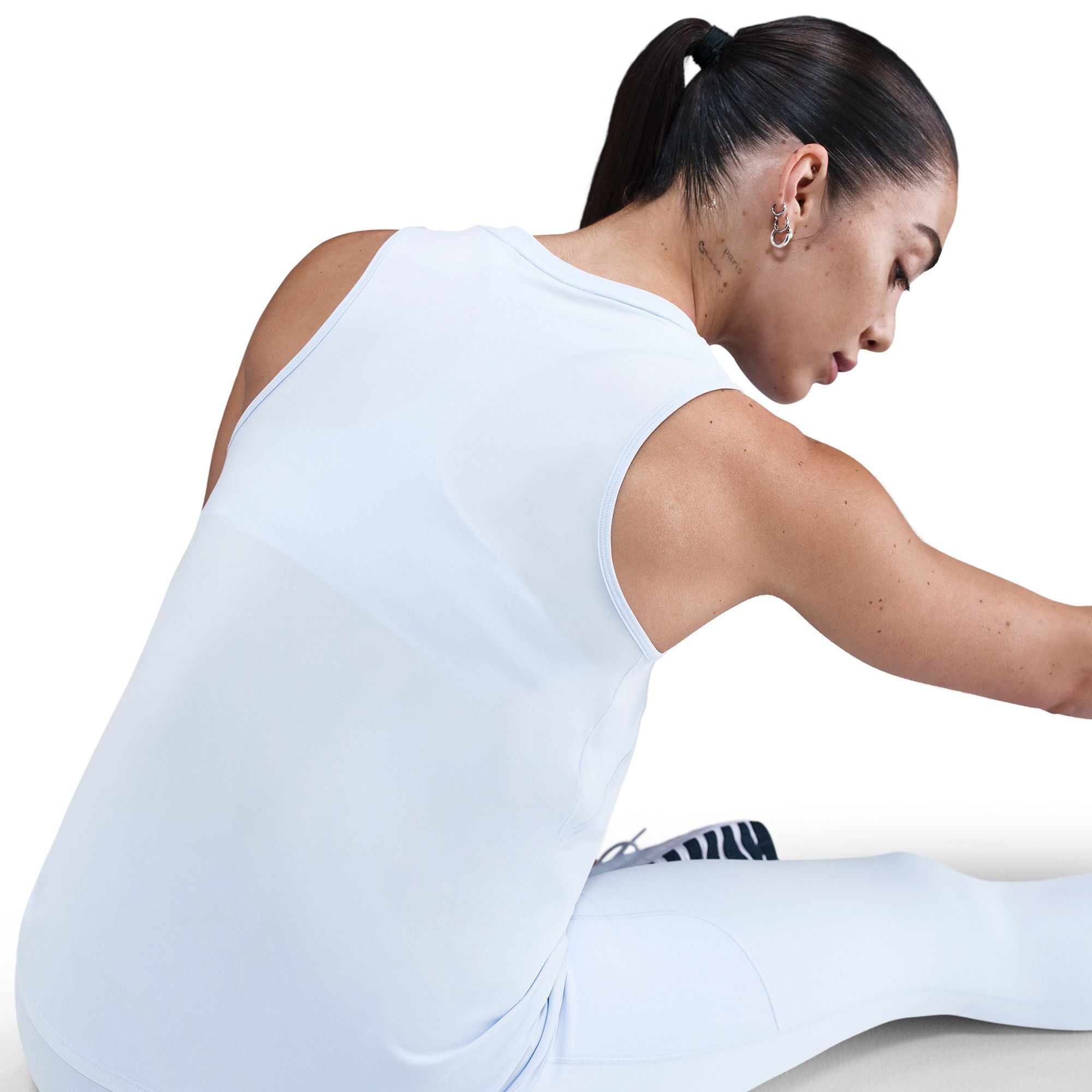 Nike One Classic tank top is ready for whatever you are. Lightweight, silky-smooth fabric dries quickly and works for wherever your day takes you. A timeless, easy-fitting style and sweat-wicking tech help you feel confident, comfortable and dry