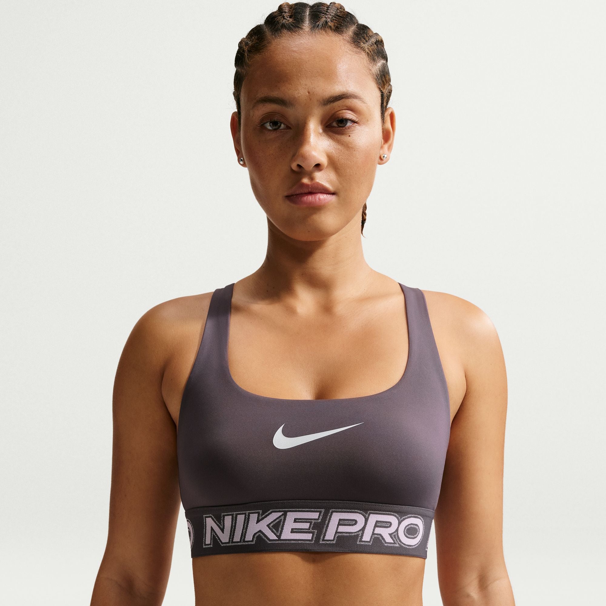 Nike Dri-FIT technology moves sweat away from your skin for quicker evaporation, helping you stay dry and comfortable.
Light support gives you a gentle hold with plenty of freedom.
Lightweight and stretchy, the smooth fabric dries quickly