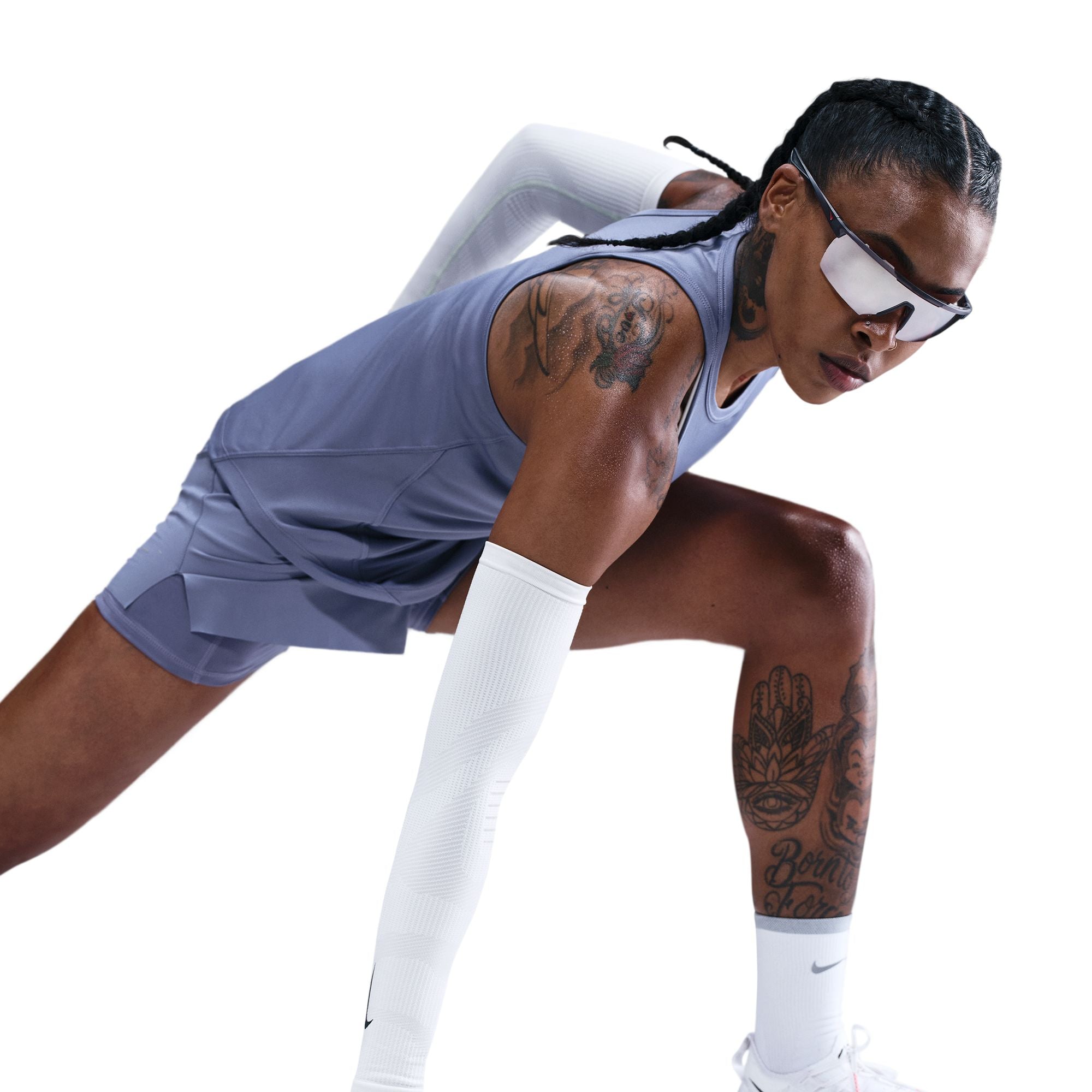 Dri-FIT Running Tank Top
Pick up your pace in this sleek, sweat-wicking Tempo tank top. It tapers around the waist and has a curved hem that gives you coverage through your stride, making for a comfortable, distraction-free run