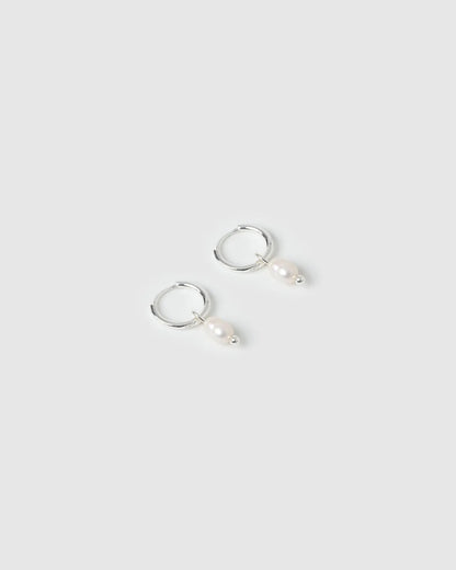 With a delicate pearl drop suspended from a classic silver huggie, Cordelia are easy to stack and style to reflect your unique look.