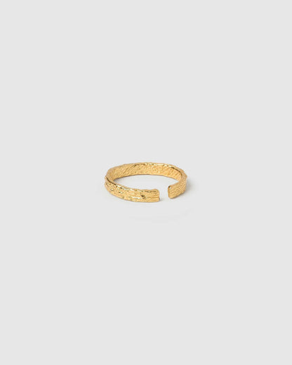 The Small Eros Textured Ring is a true beauty, both to wear and to style. With its shimmering textured surface and sleek design, it's the perfect piece to elevate your ring stack.