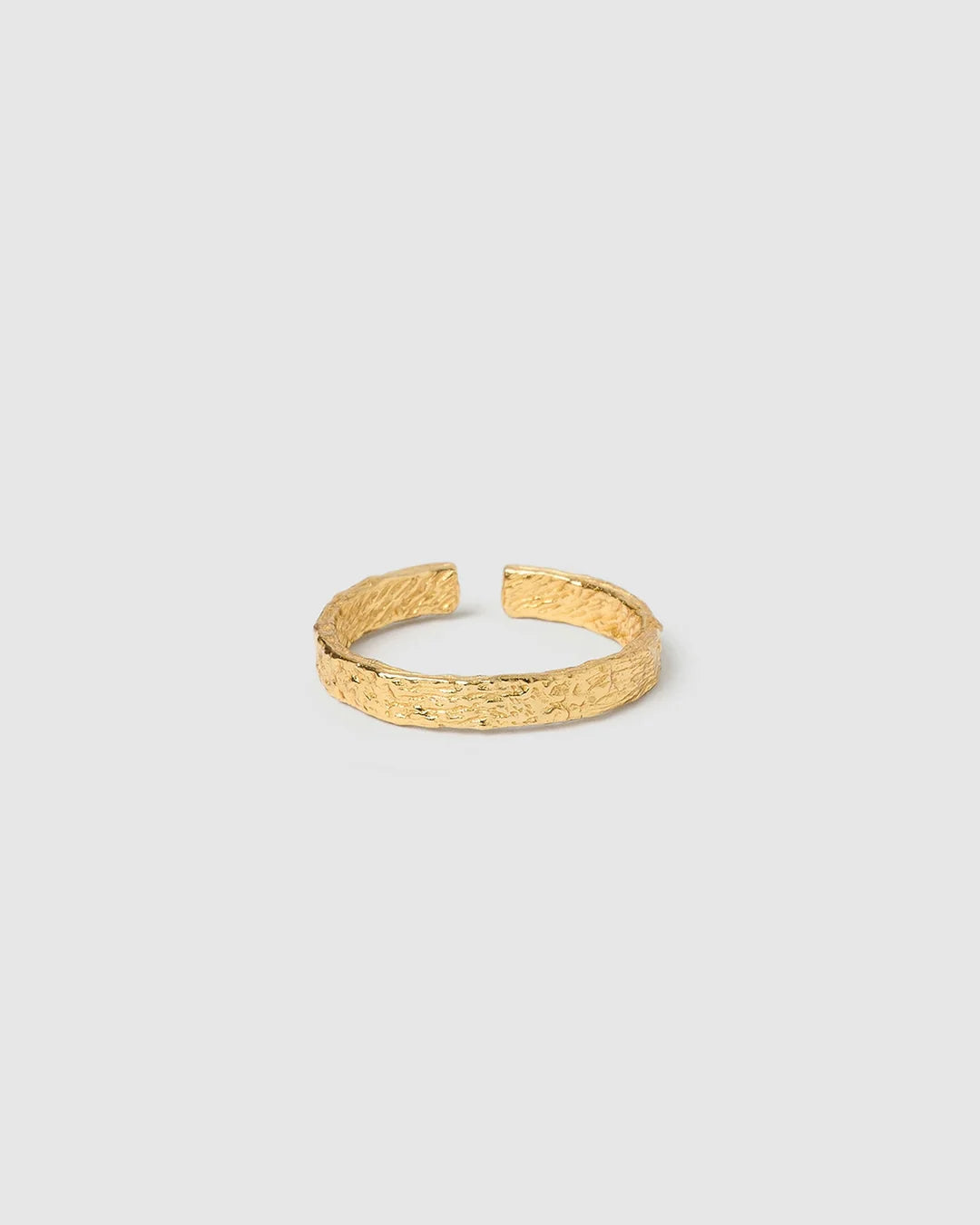 The Small Eros Textured Ring is a true beauty, both to wear and to style. With its shimmering textured surface and sleek design, it's the perfect piece to elevate your ring stack.