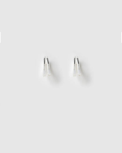Designed as huggie-style hoops, they fit snugly on the ear, making them ideal for small lobes or second piercings. Featuring a simple double hoop design, these trendy earrings add the perfect finishing touch to any look.