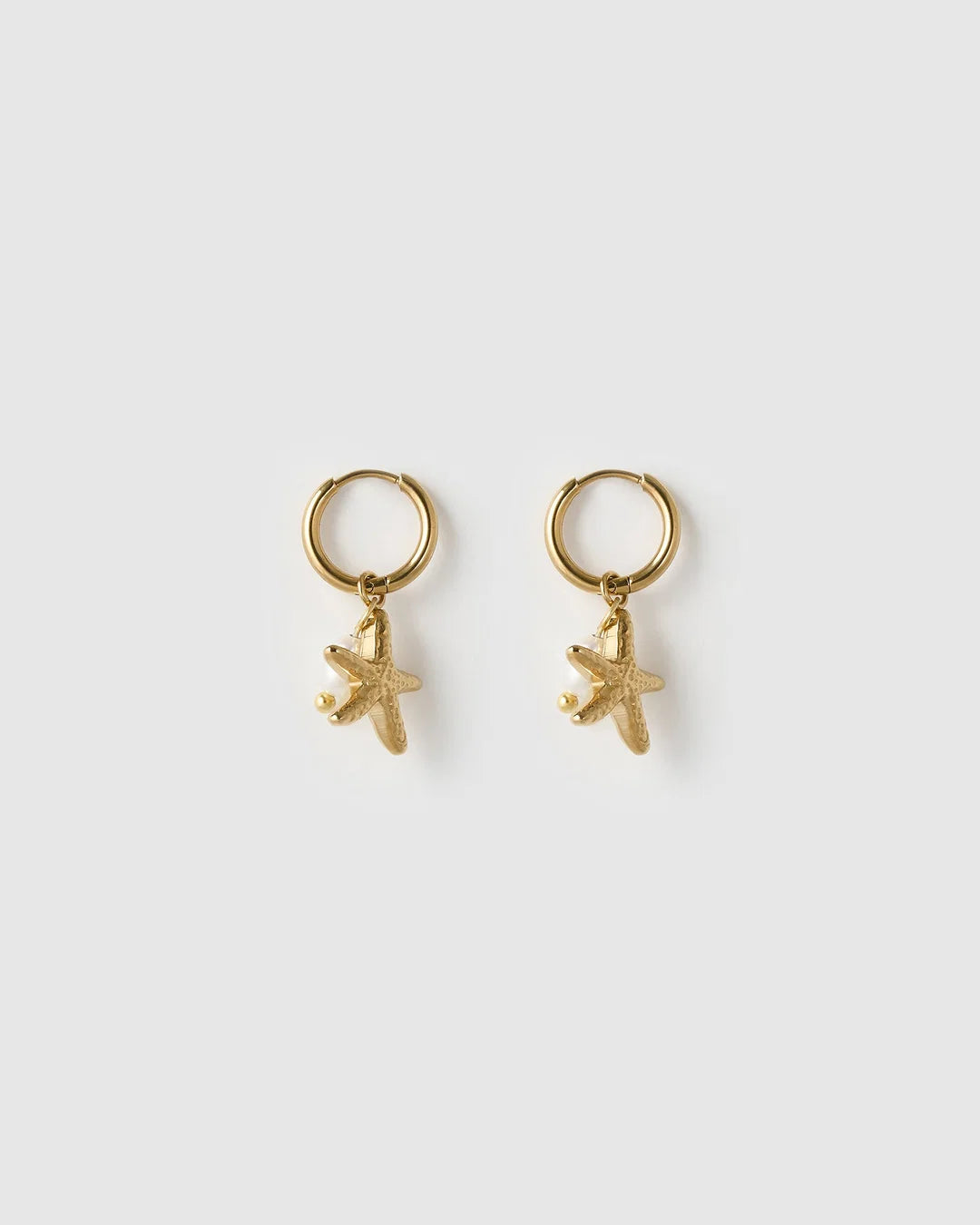 These cute starfish charms are elevated with gorgeous freshwater pearls, for a look that will take you from beach to bar.