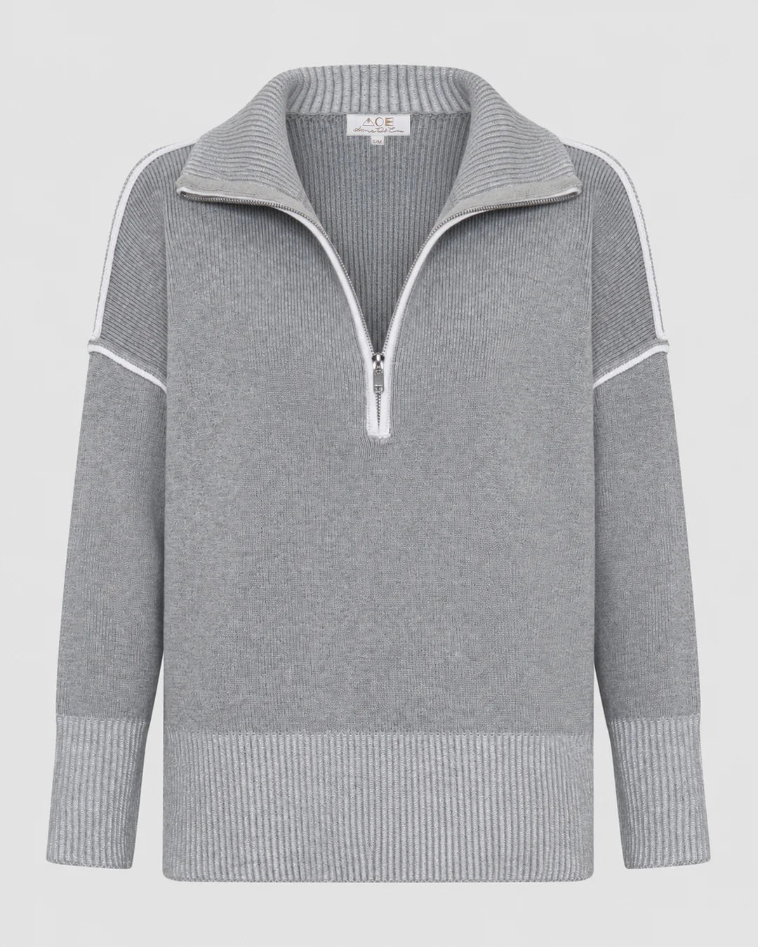 Rug up in style with the Montreal Knit, a chic layer made to keep you toasty all winter long. Crafted from 100% cotton, this oversized quarter-zip features cool contrast detailing.