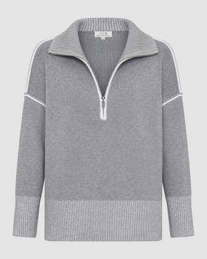 Rug up in style with the Montreal Knit, a chic layer made to keep you toasty all winter long. Crafted from 100% cotton, this oversized quarter-zip features cool contrast detailing.