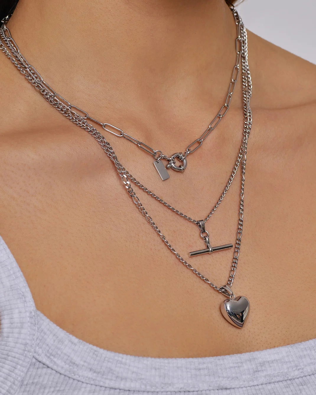 the Rose Necklace is love at first layer. Featuring a classic heart-shaped pendant with a modern, bubbly twist, it's the perfect piece for stacking or making a sweet statement on its own.