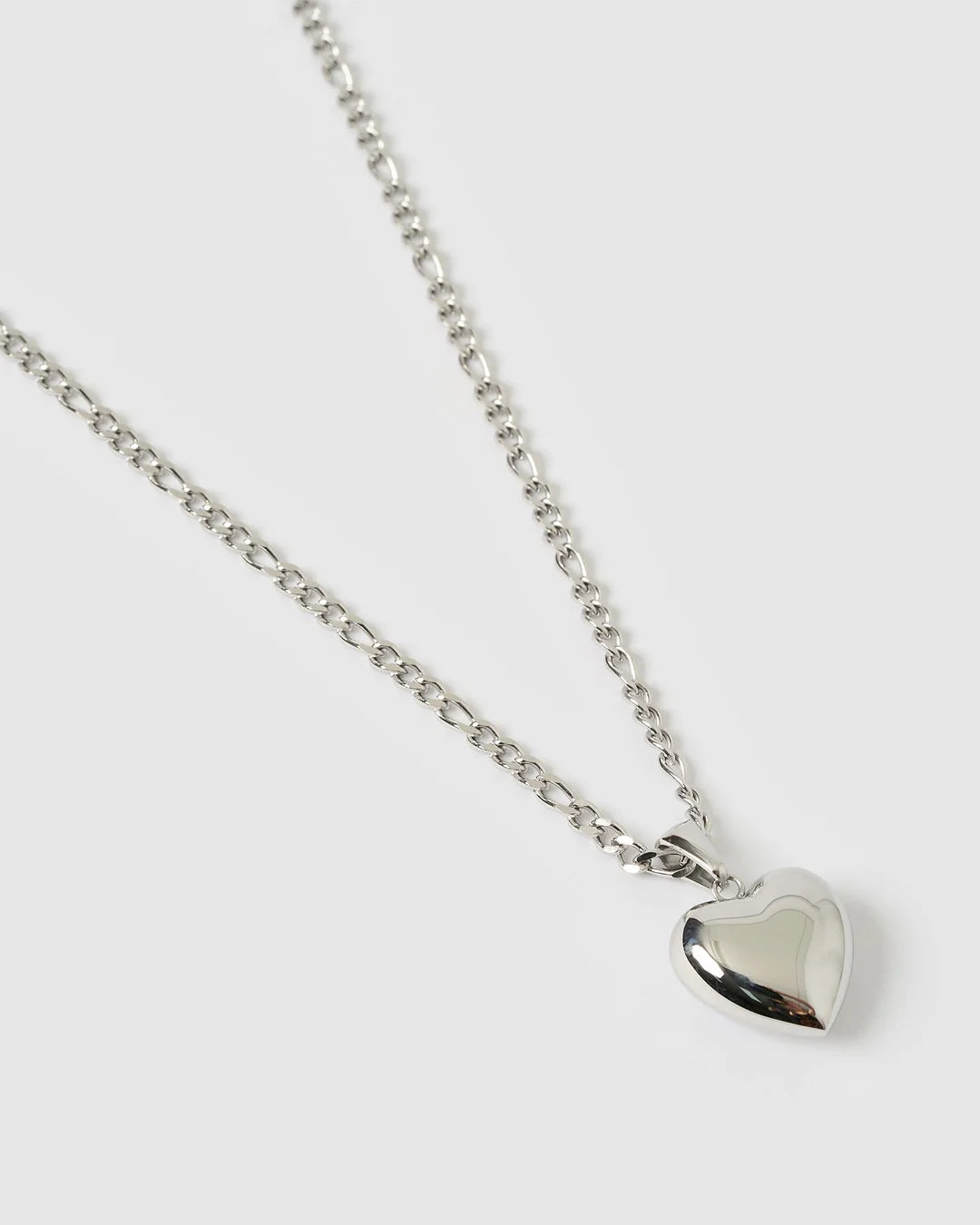 the Rose Necklace is love at first layer. Featuring a classic heart-shaped pendant with a modern, bubbly twist, it's the perfect piece for stacking or making a sweet statement on its own.