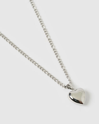 the Rose Necklace is love at first layer. Featuring a classic heart-shaped pendant with a modern, bubbly twist, it's the perfect piece for stacking or making a sweet statement on its own.
