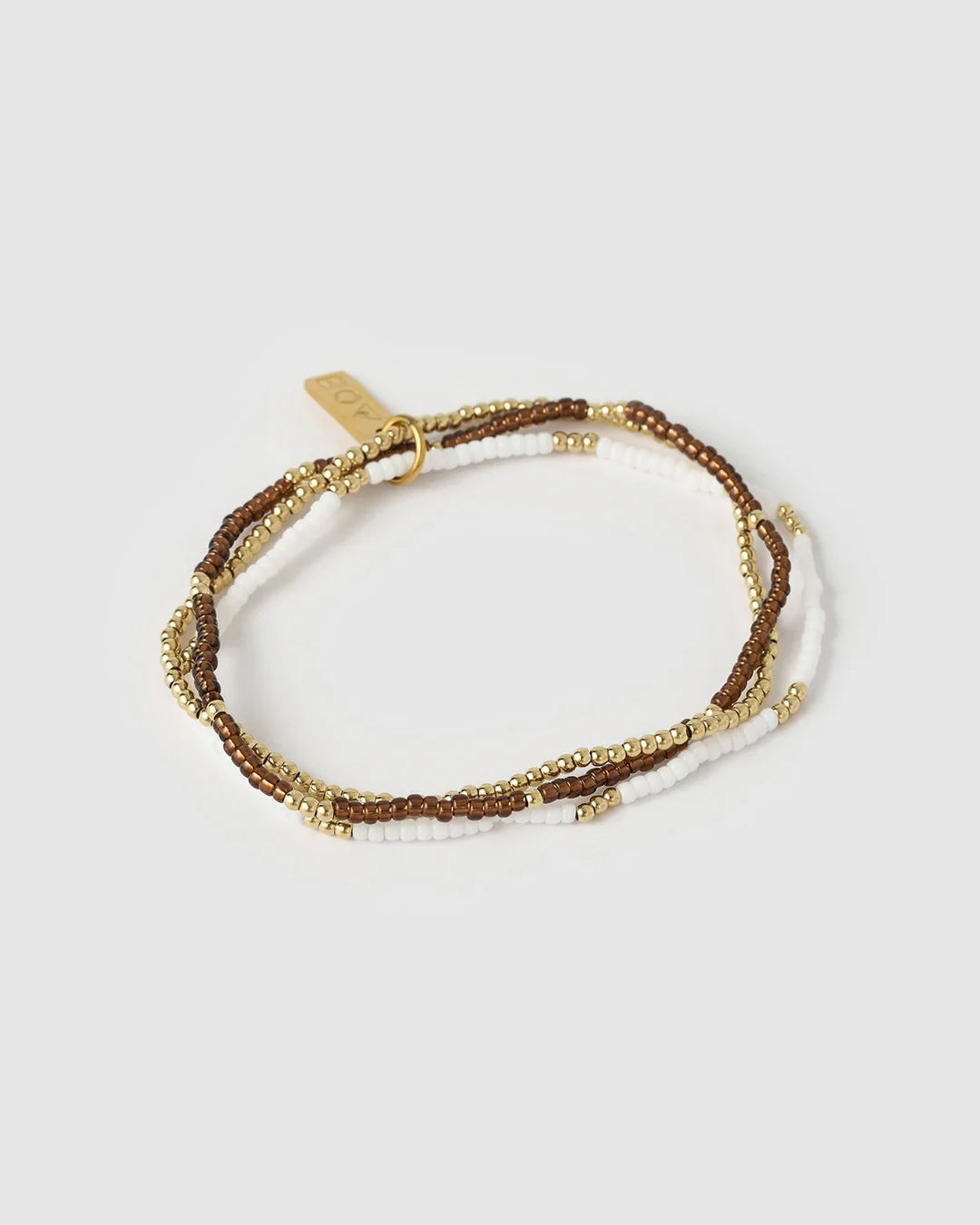  Featuring 3 beaded beauties, one gold, one white and one coffee, this set helps you mix it up and more importantly, make it fun!