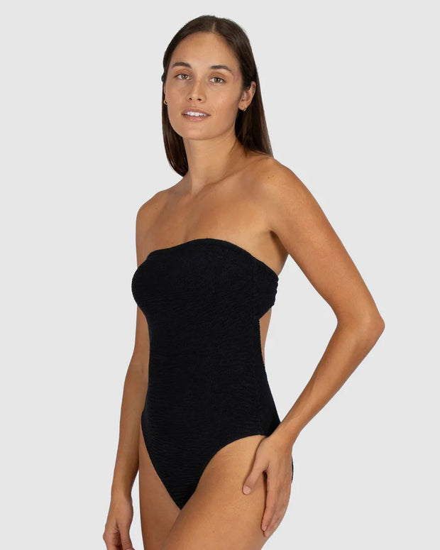 Baku's Ibiza Bandeau One Piece Swimsuit features a cut out back detail, shelf & boning support. Also it has gripper tape, soft removal cups, optional neck strap and multi A-D cup fit. Our exciting new solid Ibiza, is a vibrant, dynamic and tactile textural fabrication from Italy.