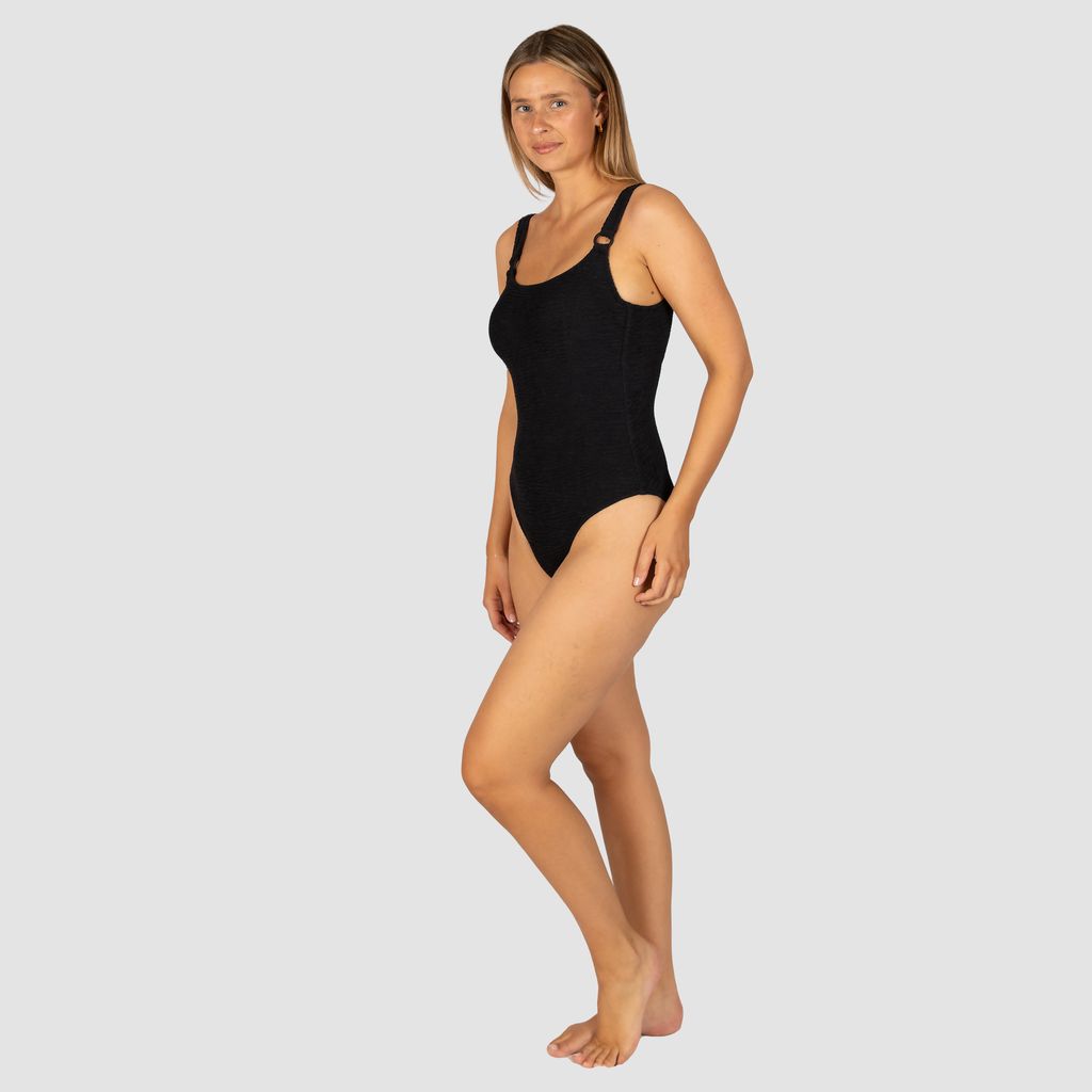 Baku's D/E Cup Underwire One Piece Swimsuit features a flattering hidden underwire, shelf support, flattering low scoop back, fully lined and ring detailing. Baku's exciting new solid Ibiza is crafted from a vibrant and dynamic crinkle fabric with a tactile texture, made in Italy.

 