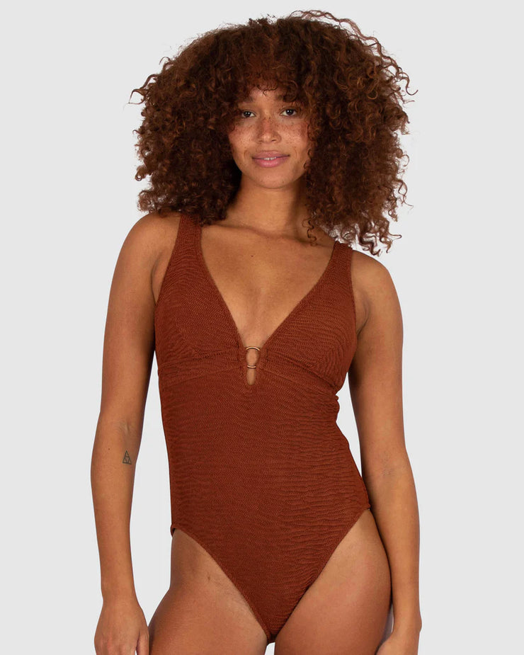 Baku's Ibiza's Longline One Piece features a flattering dropped neckline with a copper ring detail. It also has removable cups, boning and is fully lined. The exciting new solid Ibiza, is a vibrant, dynamic and tactile textural fabrication from Italy.