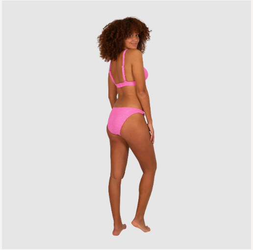 Baku's Ibiza's Ring Side Hipster Bikini Bottom features a flattering dipped waist with copper rind detailing at the side hip. It has a regular coverage bottom. The exciting new solid Ibiza, is a vibrant, dynamic and tactile textural fabrication from Italy.