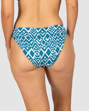 La Selva, is our captivating Ikat print that blends traditional craftsmanship with modern flair. This geometric design features intricate patterns, masterfully woven into shapes that evoke the untamed beauty of the jungle, making La Selva the perfect choice for swimwear that stands out with timeless elegance and a touch of adventurous spirit. Dive into style with La Selva, where tradition meets trend.