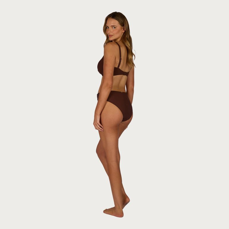 Wrap detail for a flattering, feminine silhouette
Tummy control panel for a smooth, sculpted fit
Full coverage for comfortable, confident wear