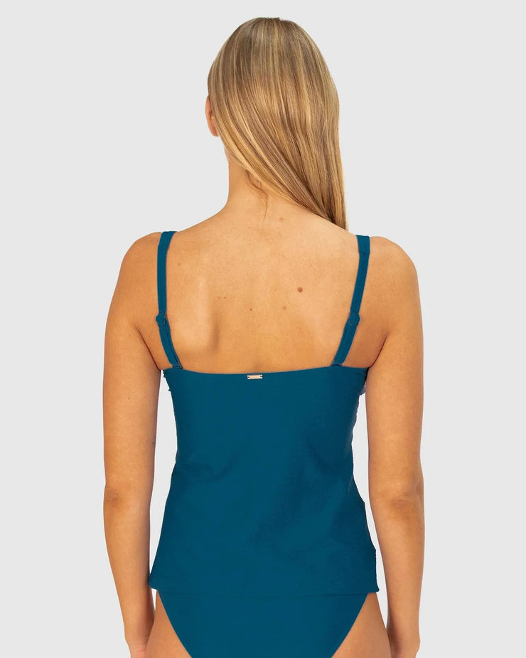 Introducing the Rococco D-E Wrap Singlet Top, crafted for both style and support. Featuring underwire shelf support and Lycra cup support, it ensures a comfortable and flattering fit. With an elegantly dipped back and adjustable straps, this singlet offers a tailored, adjustable experience for your beach outings.
