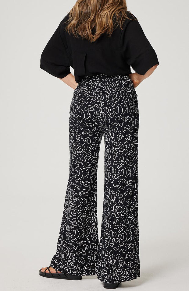 Straight leg, pull on pant Elasticated back waistband with flat front Cartel & Willow exclusive hand drawn 'Black Stencil' print 100% rayon fabric