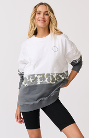 Relaxed fit panel sweater Ribbed neckline, sleeve cuffs and waistband Small round logo in black on chest Panel seams of white, khaki leopard and charcoal 100% cotton terry fabric Nikki wears a size medium and is 173cm tall