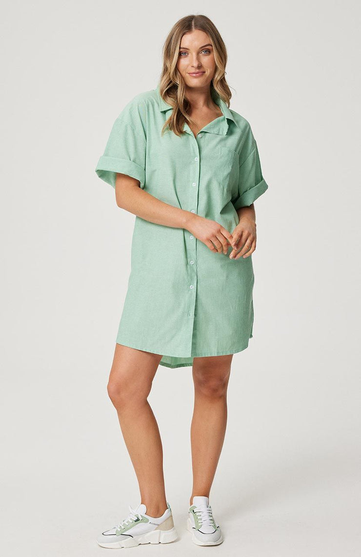 Relaxed fit, button front shirt dress Elbow length sleeve  Left chest pocket Functional buttons through the front Slight curved hemline with longer back 100% cotton chambray fabric Chantel wears a size small and is 173cm tall Balance 2023 collection