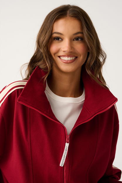 Zip-up Sweater with ribbed bib panel and oversized collar

Relaxed fit throughout the body

Wide width ribbed sleeve cuffs and hemline

Contrast stripe tape along outer sleeve

Frosted C&W rubber logo on back neckline