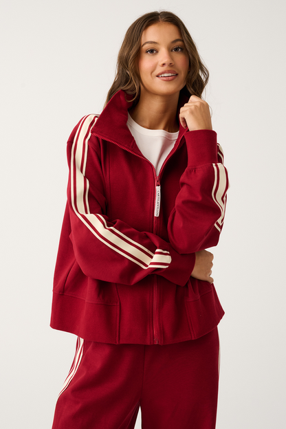 Zip-up Sweater with ribbed bib panel and oversized collar

Relaxed fit throughout the body

Wide width ribbed sleeve cuffs and hemline

Contrast stripe tape along outer sleeve

Frosted C&amp;W rubber logo on back neckline