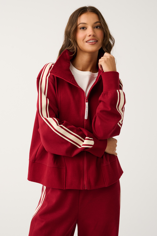 Zip-up Sweater with ribbed bib panel and oversized collar

Relaxed fit throughout the body

Wide width ribbed sleeve cuffs and hemline

Contrast stripe tape along outer sleeve

Frosted C&amp;W rubber logo on back neckline