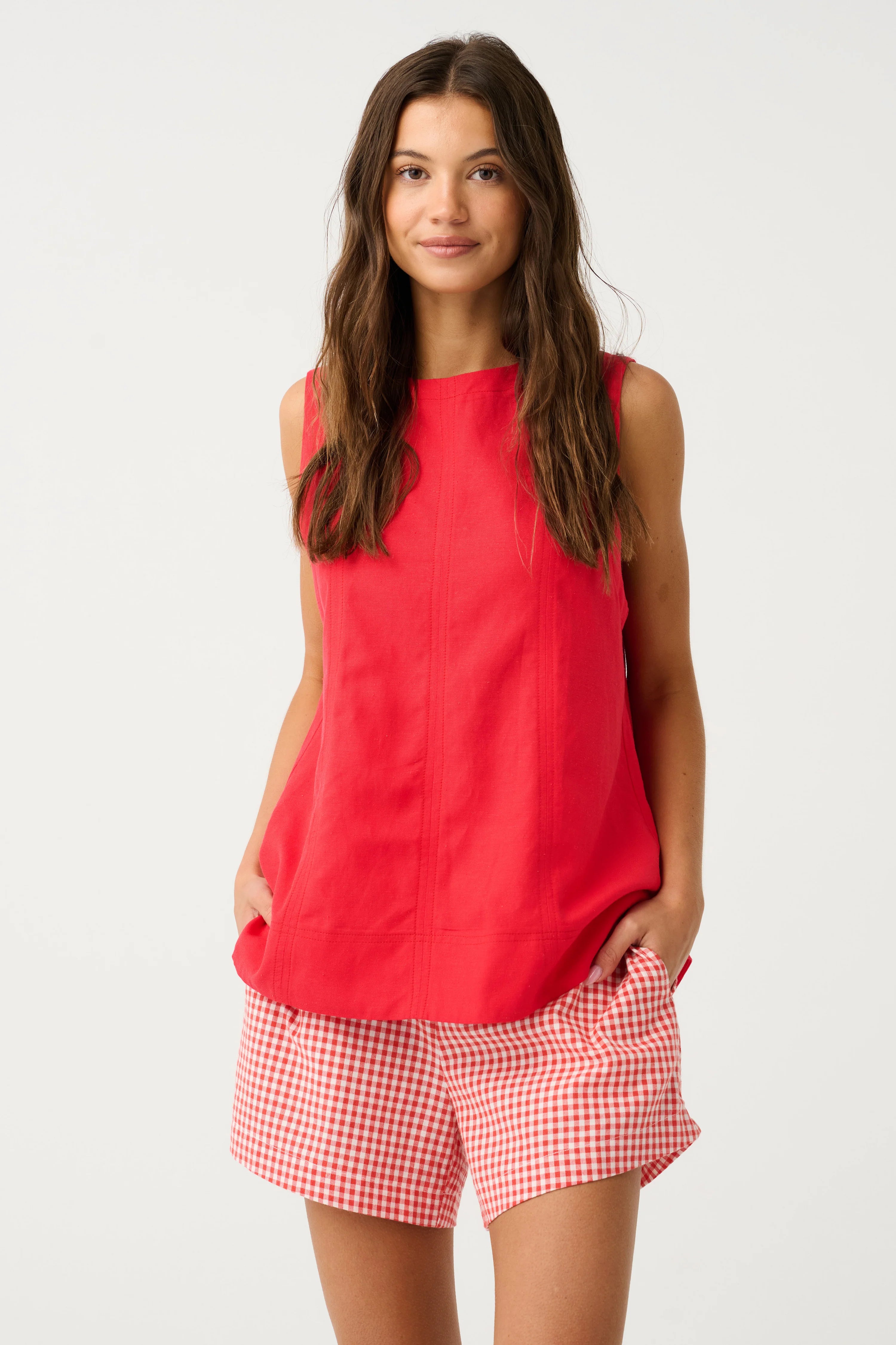 High neck tank
Center back exposed metal zip
Princess line panels with topstitching
Hip length hemline

30% Linen 70% Rayon fabric