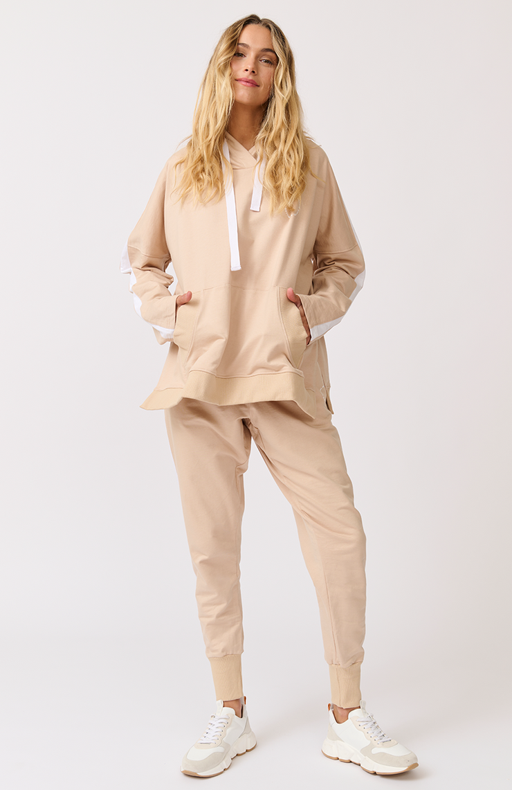 Relaxed fit, comfy, jogger style pant Elasticated waistband Scoop front pockets White stripe down the side leg Wide width ribbed ankle cuffs 1000% cotton terry fabric Nikki wears a size small and is 173cm tall