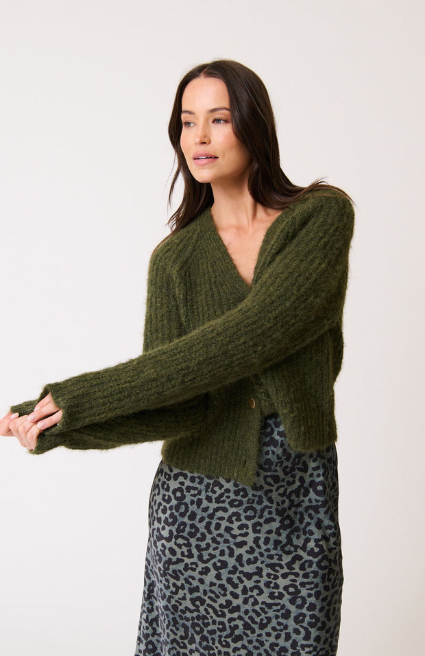  Relaxed fit, button front cardigan
• V neckline
• 5% Wool, 48% Recycled Polyester, 11% Acrylic, 36% Nylon

• Gold button detailing
• Ribbed cuffs and hem
• Samieka is 169cm and wears a size small
• Ivy League, Autumn 2025 collection 