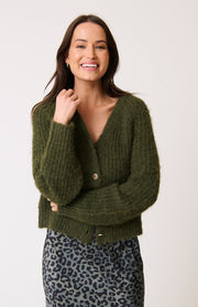  Relaxed fit, button front cardigan
• V neckline
• 5% Wool, 48% Recycled Polyester, 11% Acrylic, 36% Nylon

• Gold button detailing
• Ribbed cuffs and hem
• Samieka is 169cm and wears a size small
• Ivy League, Autumn 2025 collection 