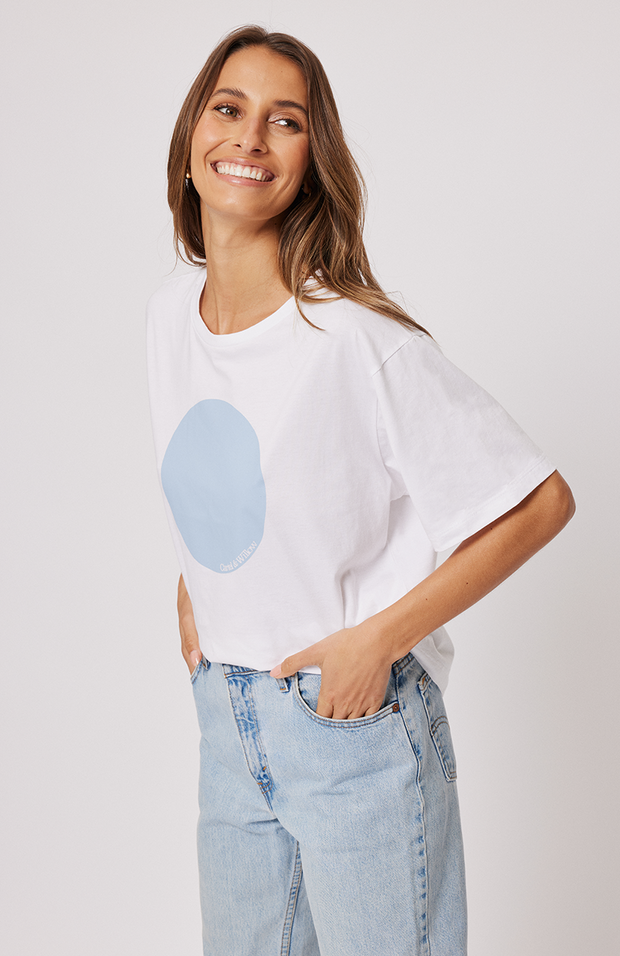 Boxy fit t-shirt Short sleeve Straight hemline CB seam detail Small Cartel & Willow pip tag along the left side seam Powder blue circle graphic print on the chest 100% cotton jersey fabric