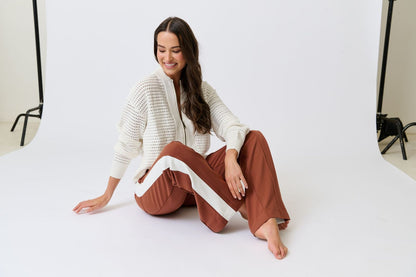 Knit bomber style zip through jacket
Open pointelle knit pattern
Ribbed neck, hemline, sleeve cuffs and zipper placket
Dropped shoulder with long sleeves
Designed to be turned up at the hem for a relaxed look
75% viscose, 25% polyester knit fabric