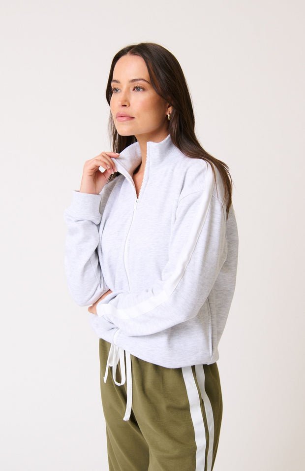 • Relaxed fit, zip front jacket
• 100% French Terry Cotton
• Drop shoulder
• Ribbed collar, cuffs and hem
• Grosgrain detailing along outer sleeves
• Samieka is 169cm and wears a size small

• Ivy League, Autumn 2025 collection 