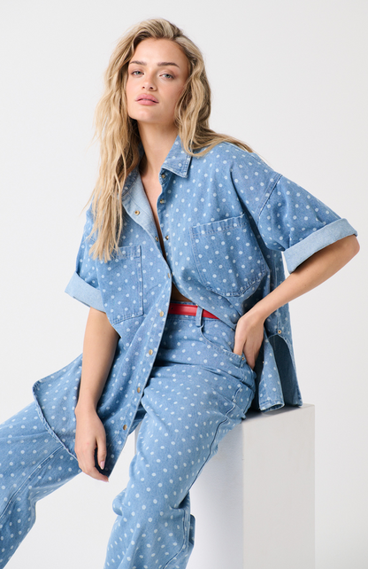 Button front denim shirt
Elbow length sleeve
Front chest patch pockets
Longline curved hemline
Brushed gunmetal hardware

100% Cotton denim fabric with vintage wash treatment