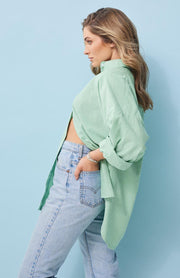 Oversized fit, button front shirt Longline, curved hemline Full length sleeve with button cuff 100% cotton chambray fabric in yarn dyed Jade Chantelle wears a size small and is 173cm tall Balance 2023 collection