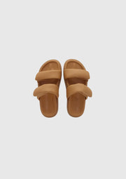 Leather slide with adjusted velcro padded straps and moulded sole  Leather upper  Padded adjustable velcro straps  1.5cm moulded sole with footbed leather lining