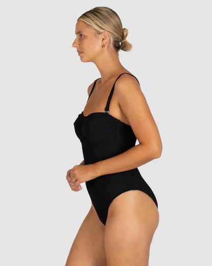 Hidden underwire and boning support for added structure 
Removable and adjustable straps for versatile styling
U-trim detailing at the front
Removable soft cups
Fully lined
Gripper elastic for a secure fit
Crinkle Fabric
Fabric: 93% Polyamide / 7% Elastane
Fabric: Made in Italy
Designed and Made in Australia